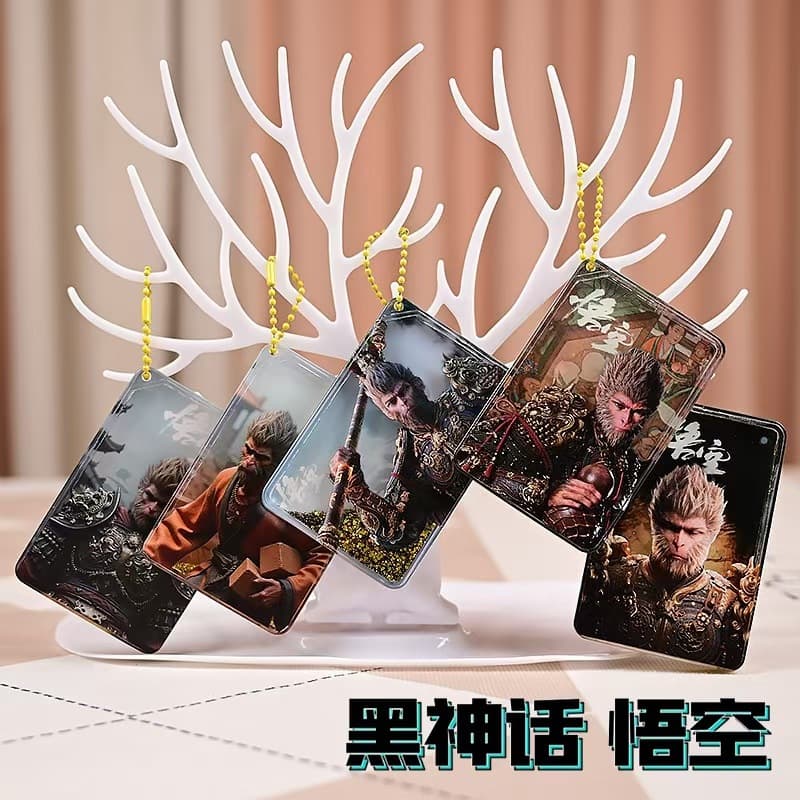 New black myth Wukong quicksand painting ornaments schoolbag pendant acrylic running water painting crystal powder key chain pendant